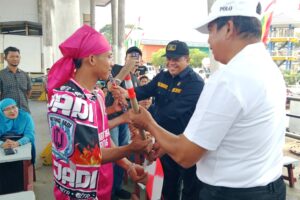 Ketua DPRD Inhu Hadiri Pelepasan Pacu Sampan Mini di Danau Raja